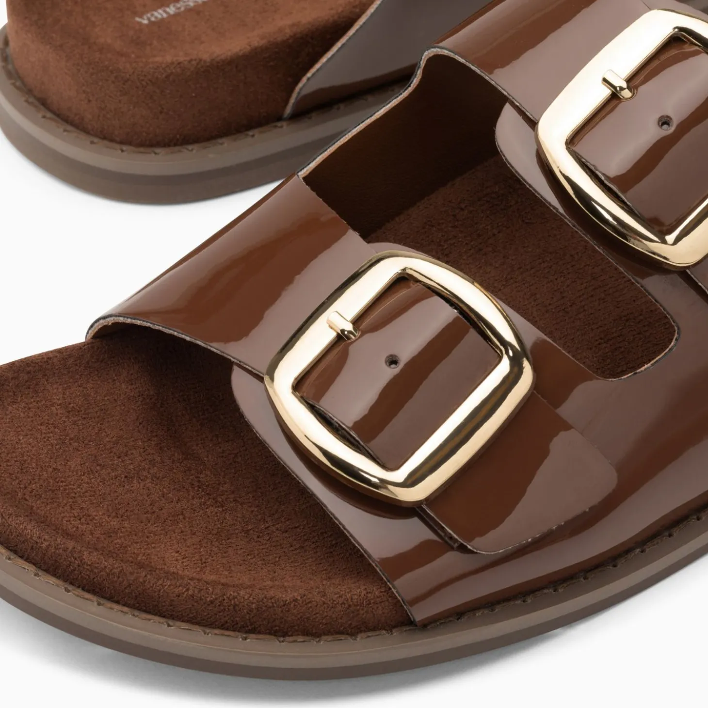 Mules Plates Celia Marron Verni A Boucles Oversize