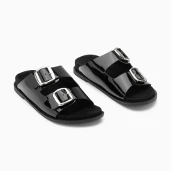 Mules Plates Celia Noir Verni A Boucles Oversize