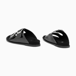 Mules Plates Celia Noir Verni A Boucles Oversize